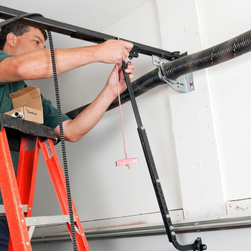 expert maintaining garage door
