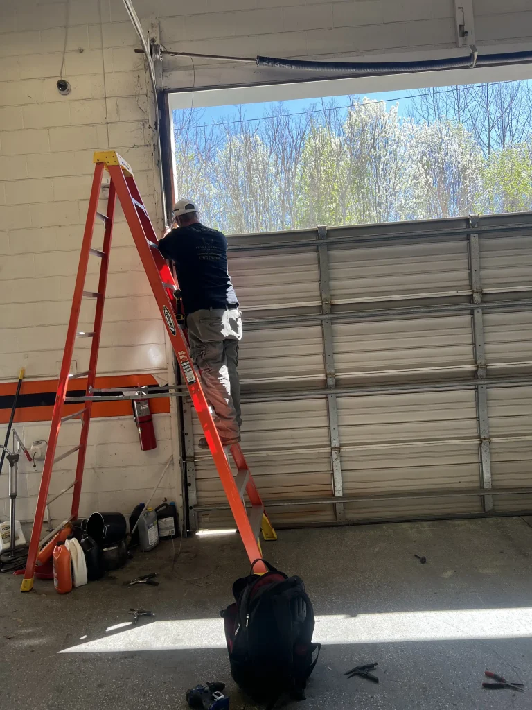 expert working on garage door
